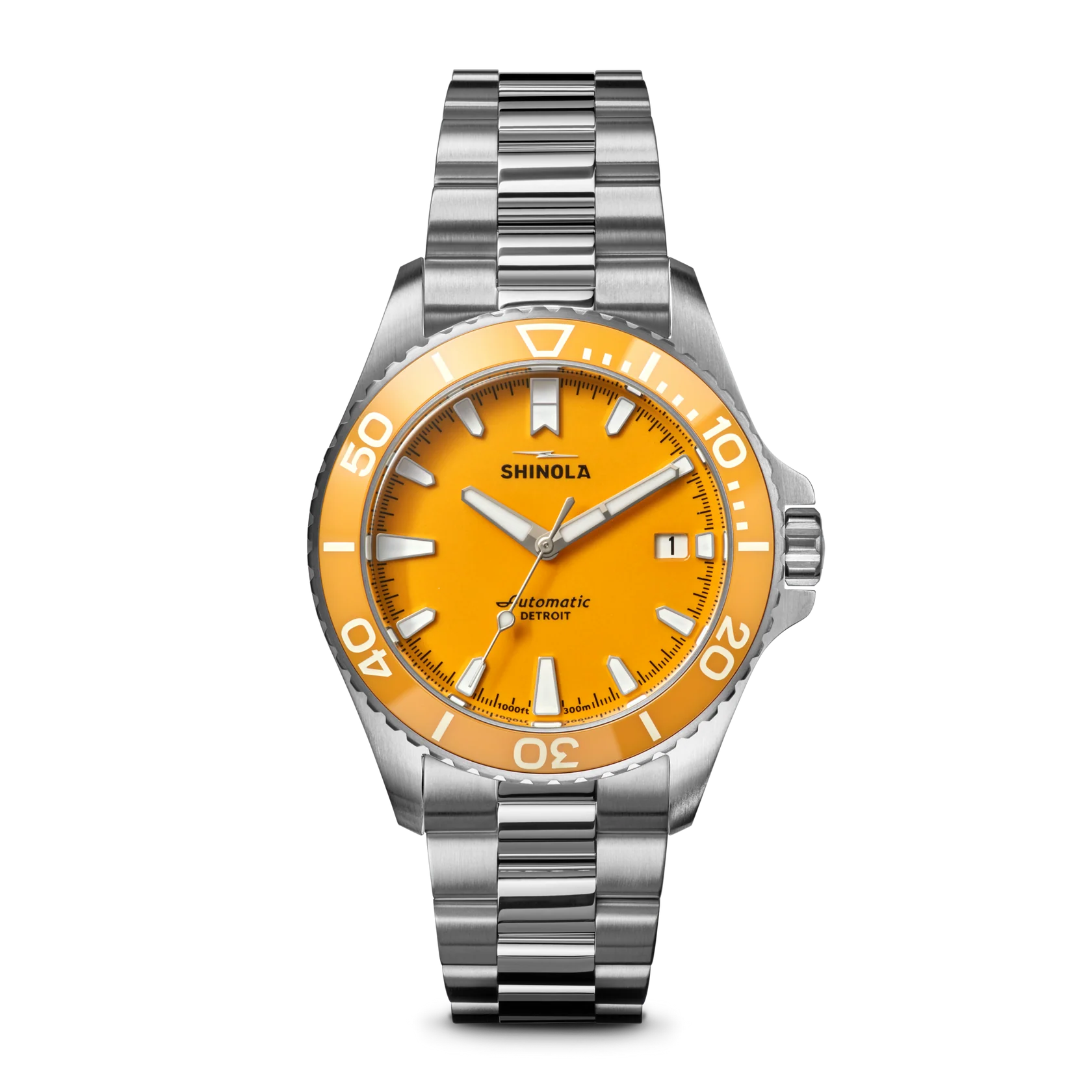 Shinola watch with orange face and silver bracelet on a white background