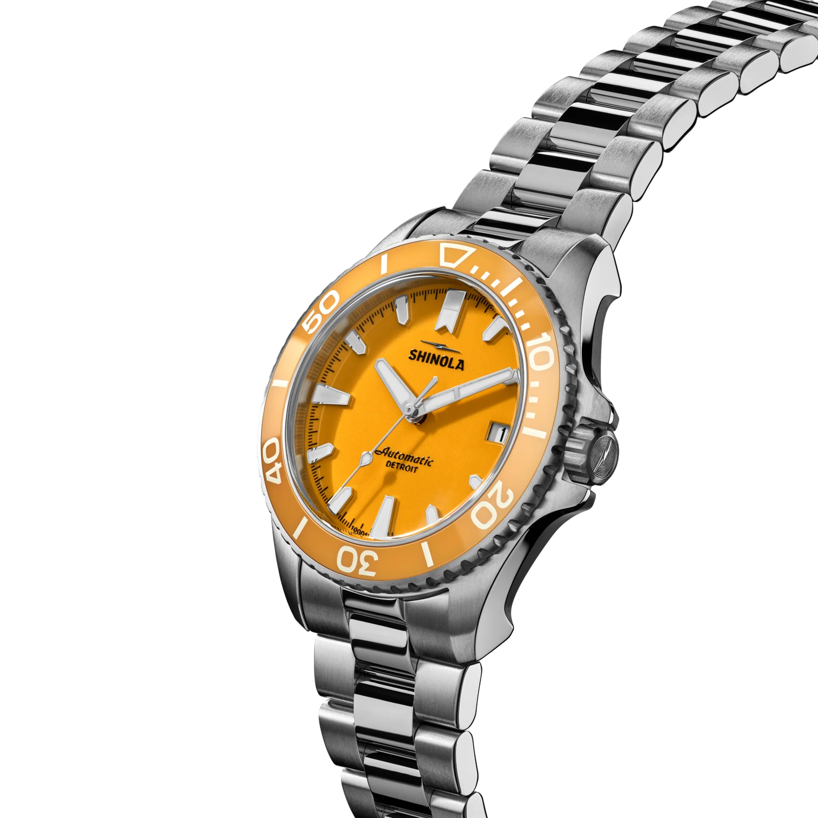 Shinola watch with orange dial and silver metal strap on white background
