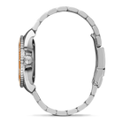 Close-up of a silver watch with a detailed band on a white background