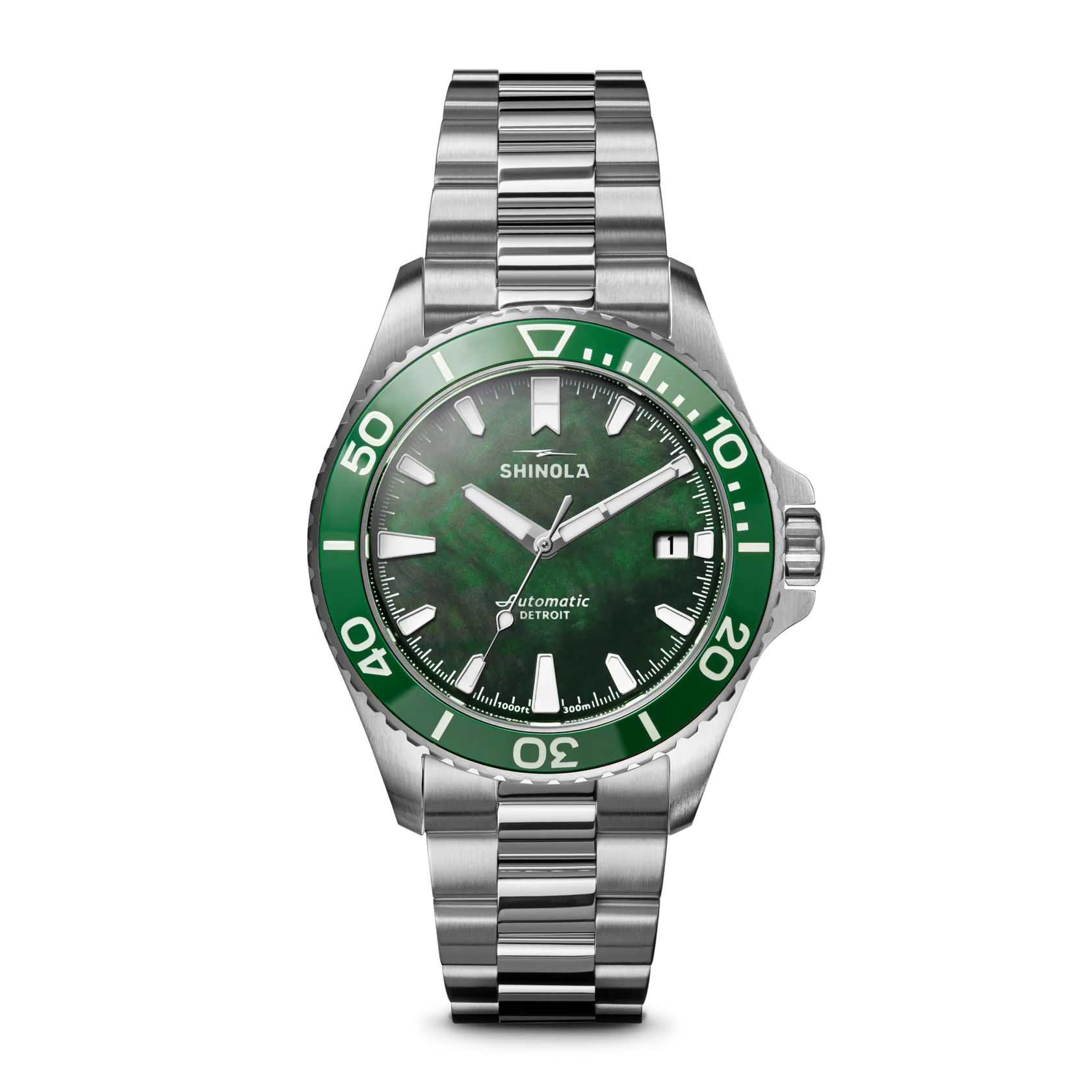 Shinola watch with green dial and silver bracelet on a white background