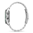 Close-up of a silver watch with a green face on a white background
