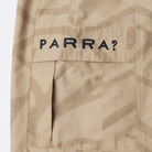 Beige cargo pocket with 'PARRA?' logo on a white background