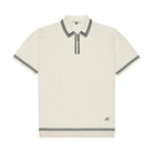 White polo shirt with black trim on a white background