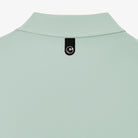 Light green shirt collar with a brand tag on a white background