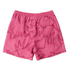 Pink shorts with an abstract pattern on a white background