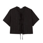 Black short-sleeve top on a white background
