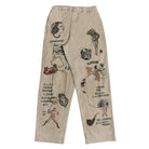 Beige canvas cargo pants featuring vintage-style embroidered illustrations and text on both legs, including pin-up girl graphics and names