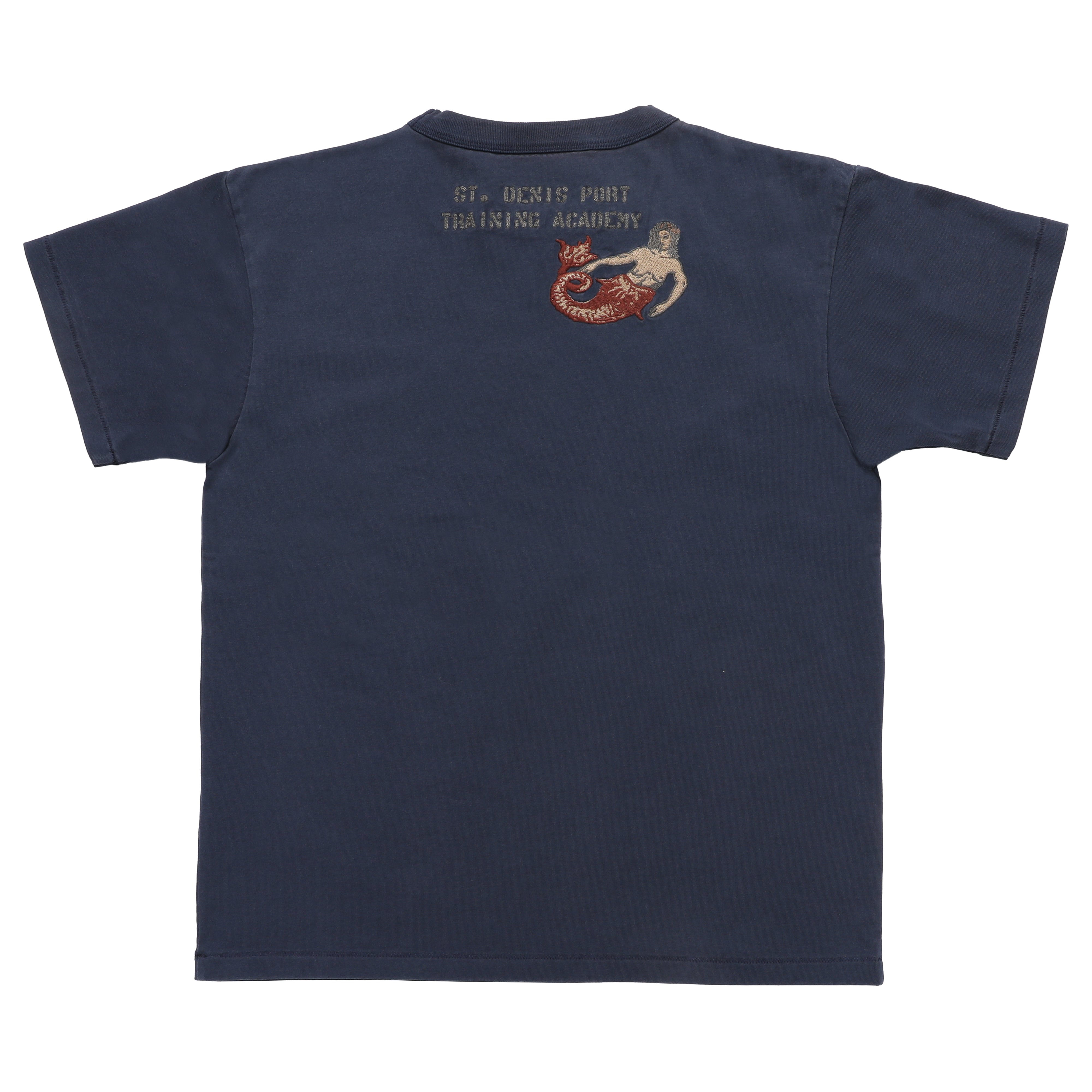 A navy blue short-sleeve t-shirt shown from the back, featuring a small graphic print on the upper right shoulder with the text 'ST. DENIS PORT TRAINING ACADEMY' and an illustration of a mermaid.