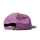 Back of a purple cap on a with an adjustable strap on a white background 