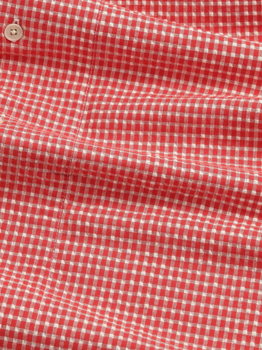 NN.07 Reed Seersucker Overshirt in red and white gingham check pattern, close-up view