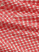 NN.07 Reed Seersucker Overshirt in red and white gingham check pattern, close-up view