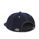 Blue denim cap with a logo on a white background