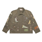 Green jacket with various patches on a white background