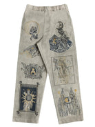 Light-colored pants with graphic designs on a white background