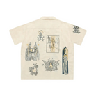 Beige shirt with black graphic designs on a white background