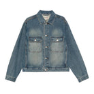 Front view of the Stüssy Trucker Denim jacket in dark wash indigo laid flat. A faded, vintage-washed denim jacket with silver buttons and two flap chest pockets.