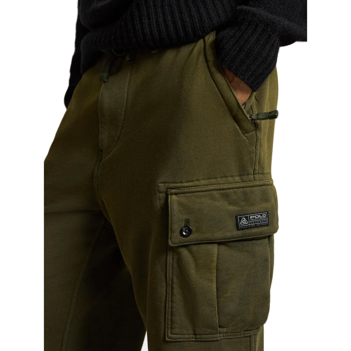 Close-up of the cargo pocket on the olive fleece pant, showing the button flap and the Polo Ralph Lauren Outdoors “Expedition Equipment” patch.