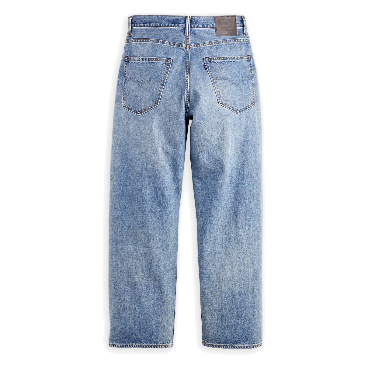 Levi’s Blue Tab Marker Loose Selvedge Jeans in medium blue, back view laid flat on white, showing a leather-look waistband patch and arcuate-stitched back pockets.