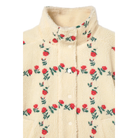 Close-up of the high collar on The Tiny Big Sister Roses Grid Sherpa Jacket, showing the textured cream sherpa, embroidered red roses, and tonal snaps.