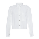 Front view of the AMO Ruth Crop Shirt in white, laid flat on white, showing the point collar, shell buttons, single chest pocket and cropped hem.