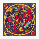 A square scarf featuring a colorful zodiac astrological chart design on a dark navy blue background with a gold circular border.