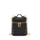 A black pebbled leather cylindrical backpack with gold-tone hardware, featuring a top handle, a front zippered pocket with two gold zipper pulls, and a gold chain shoulder strap, shown on a plain white background.